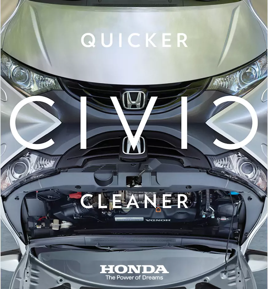Close-up view of a clean Honda Civic engine compartment under the open hood with text reading Civic Cleaner