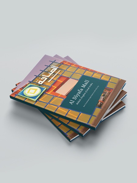 Stack of printed corporate magazines and brochure designs representing Alignian global print work